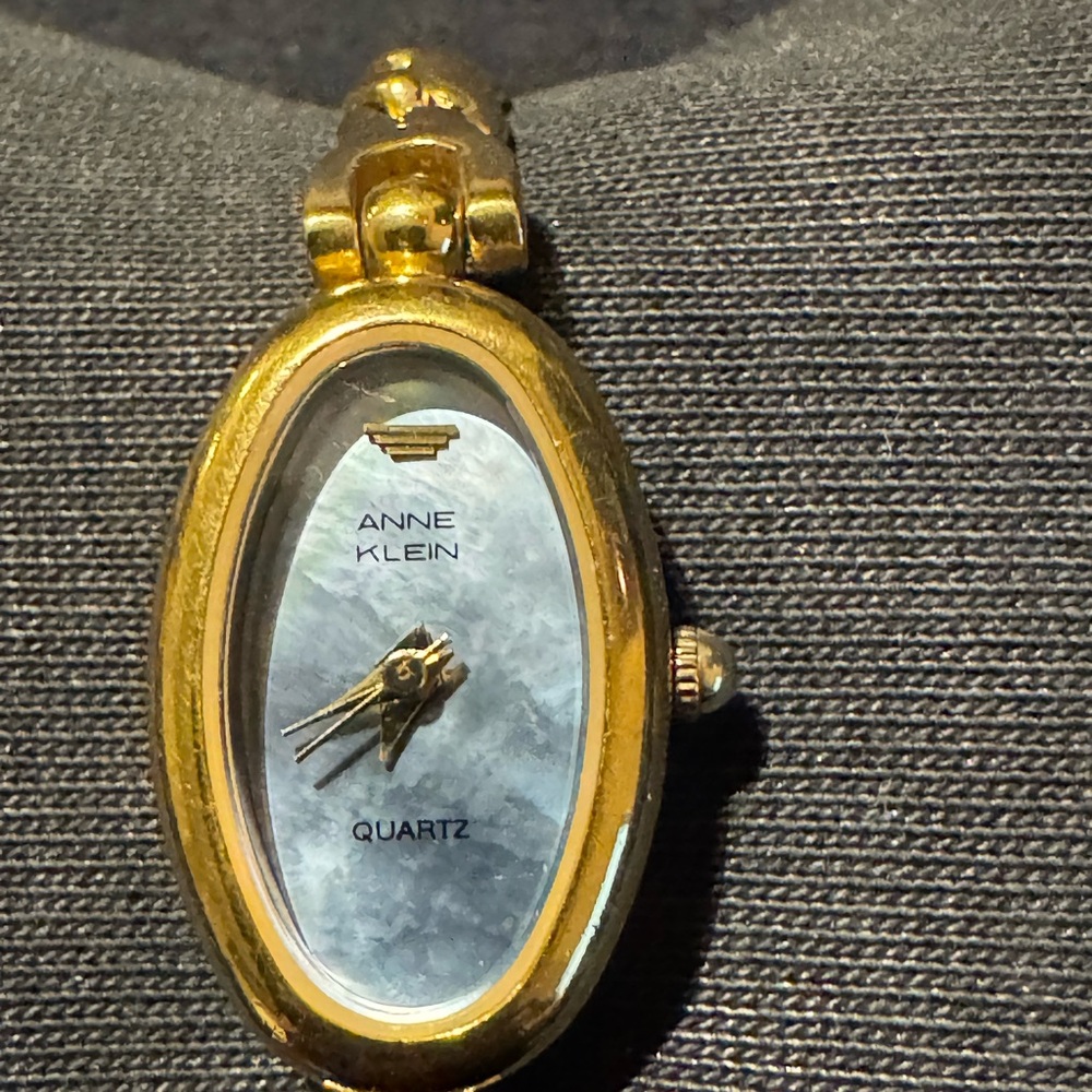 Anne Klein Gold Tone Watch with Mother of Pearl Dial